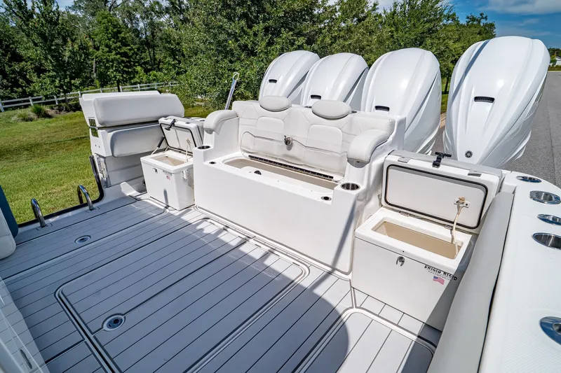  Yacht Photos Pics 2021 HCB Lujo boat interior with seating and storage compartments.