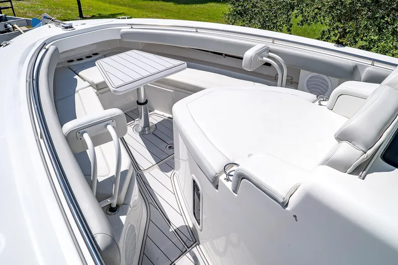  Yacht Photos Pics Luxurious 2021 HCB Lujo boat interior with white seating and table.