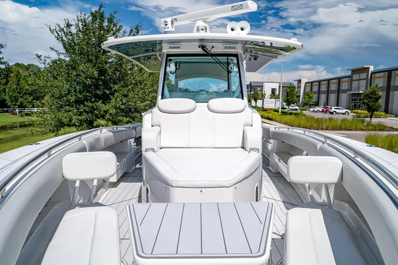  Yacht Photos Pics 2021 HCB Lujo boat interior with white seating and modern design.