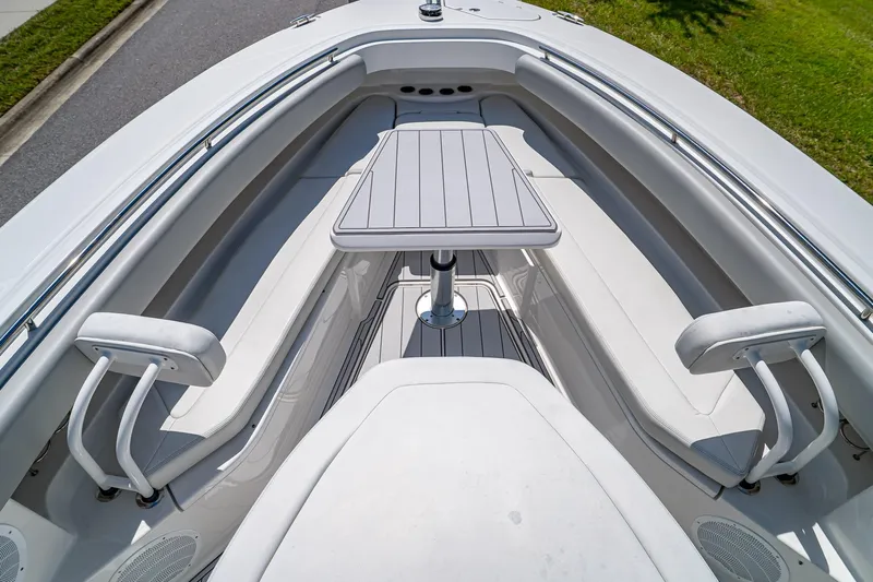  Yacht Photos Pics 2021 HCB Lujo boat interior with seating and table, showcasing luxury design.