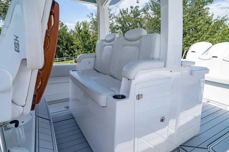  Yacht Photos Pics Luxurious seating on 2021 HCB Lujo boat, featuring white leather and sleek design.