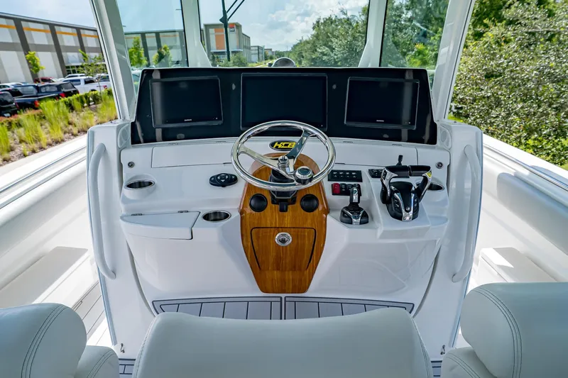  Yacht Photos Pics Helm of 2021 HCB Lujo boat with modern controls and steering wheel.