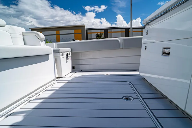  Yacht Photos Pics 2021 HCB Lujo boat interior with sleek white seating and modern design.