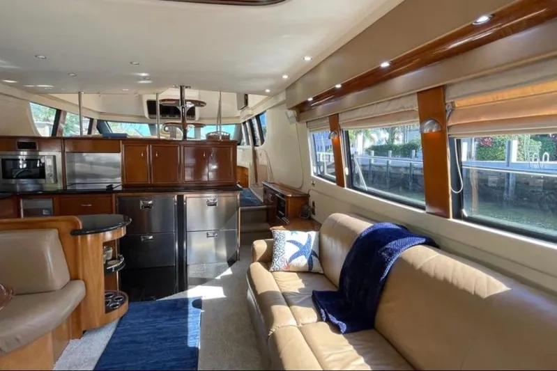  Yacht Photos Pics Luxurious interior of a 2005 Carver 56 Voyager yacht with elegant furnishings and modern amenities.