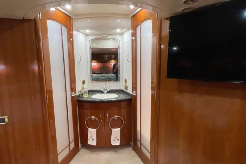  Yacht Photos Pics Luxurious 2005 Carver 56 Voyager yacht interior with elegant wood finish and modern amenities.