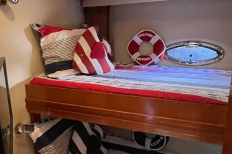  Yacht Photos Pics Bunk bed with nautical decor in 2005 Carver 56 Voyager yacht cabin.