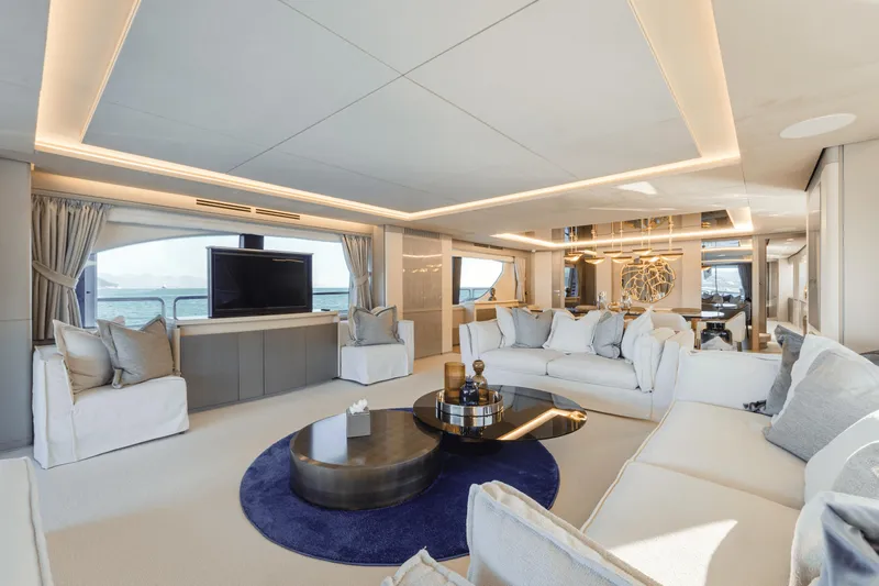 Serendipity Yacht Photos Pics Luxurious interior of 2008 Azimut 116 yacht with modern furnishings and ocean view.