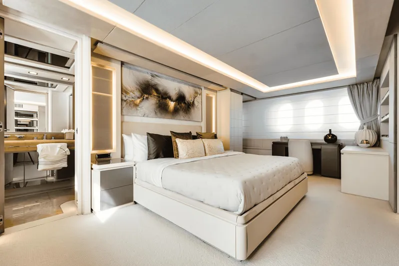 Serendipity Yacht Photos Pics Luxurious bedroom interior on 2008 Azimut 116 yacht, featuring modern design and elegant decor.