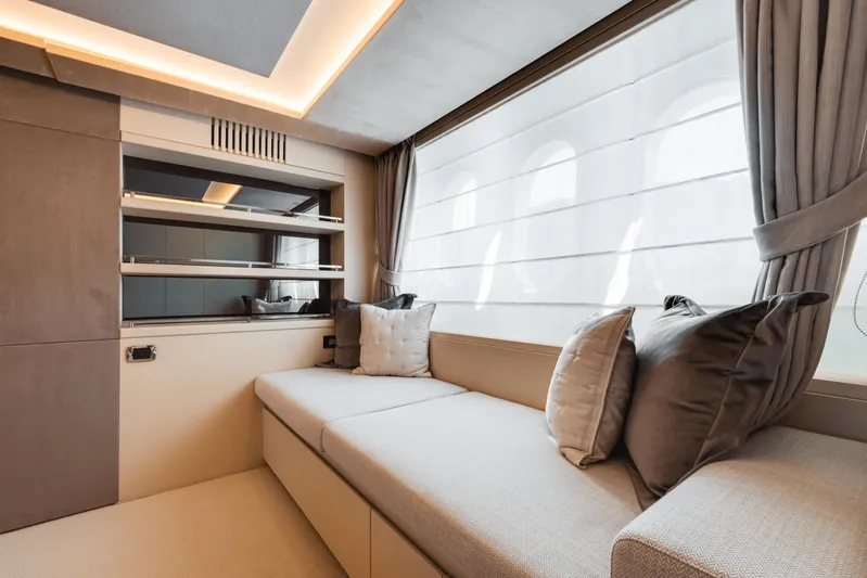 Serendipity Yacht Photos Pics Luxurious interior of 2008 Azimut 116 yacht with elegant seating and modern design.