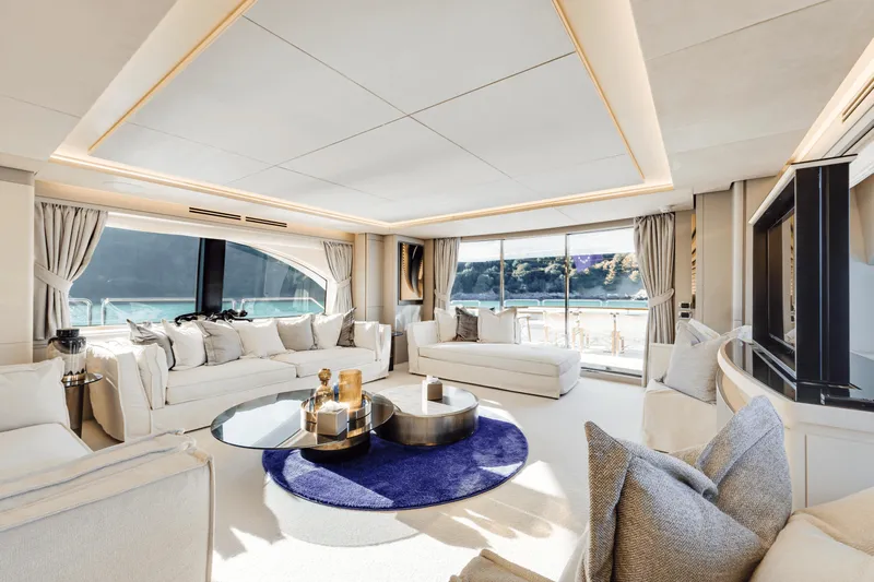 Serendipity Yacht Photos Pics Luxurious interior of 2008 Azimut 116 yacht with elegant seating and ocean view.