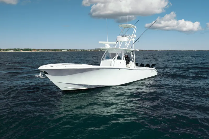 Afishinsea Yacht Photos Pics 2014 Yellowfin 39 Offshore boat on open water under blue sky.