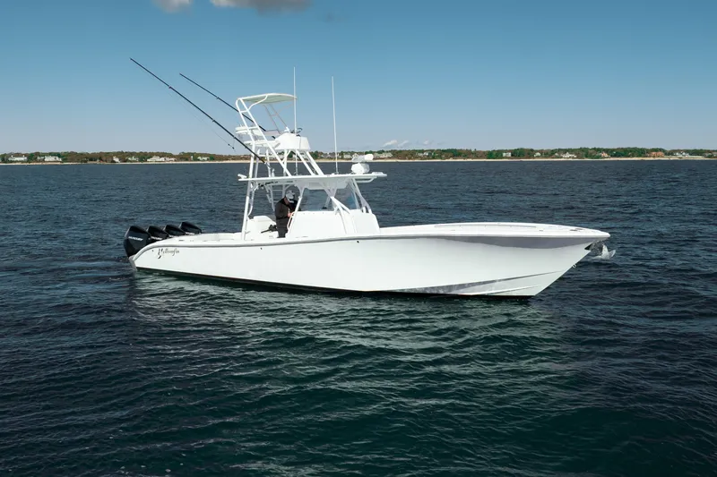 Afishinsea Yacht Photos Pics 2014 Yellowfin 39 Offshore boat on open water, featuring multiple outboard engines.