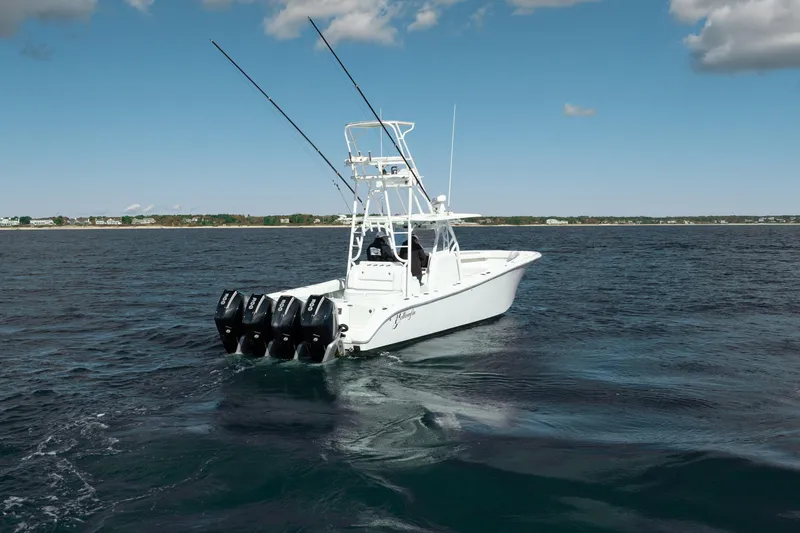 Afishinsea Yacht Photos Pics 2014 Yellowfin 39 Offshore boat with multiple outboard engines on open water.