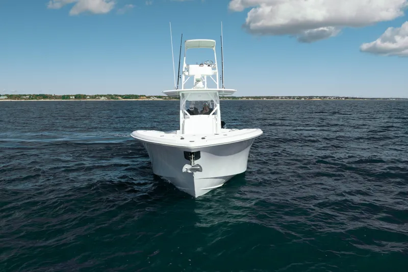 Afishinsea Yacht Photos Pics 2014 Yellowfin 39 Offshore boat cruising on open water under a clear sky.