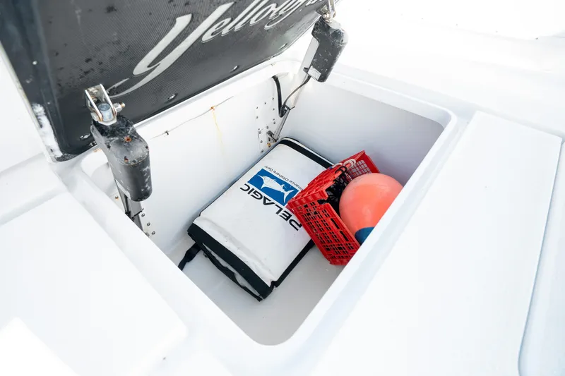 Afishinsea Yacht Photos Pics Storage compartment on a 2014 Yellowfin 39 Offshore boat with gear and equipment.