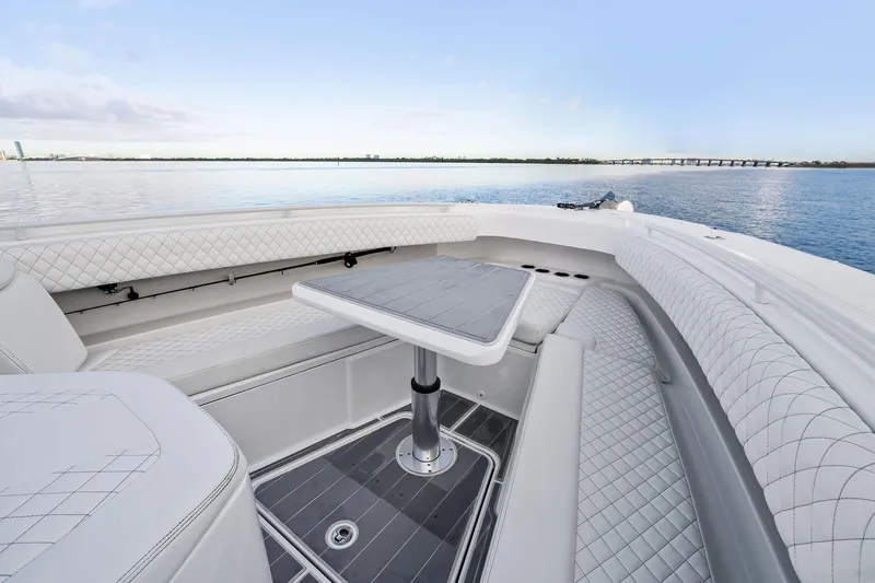 No Name Yacht Photos Pics Luxurious seating area on 2023 HCB 42 Lujo boat with ocean view.