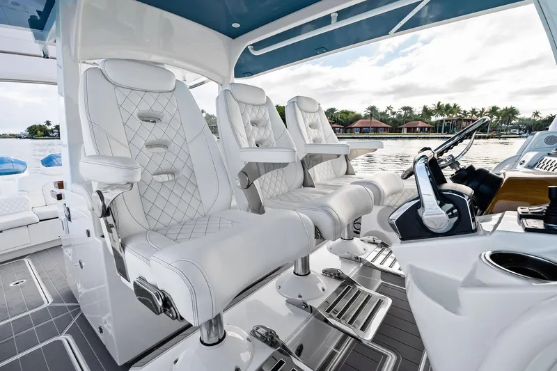 No Name Yacht Photos Pics Luxurious interior of 2023 HCB 42 Lujo boat with plush white seating.