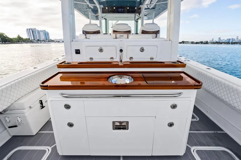 No Name Yacht Photos Pics 2023 HCB 42 Lujo boat interior with sleek cabinetry and ocean view.