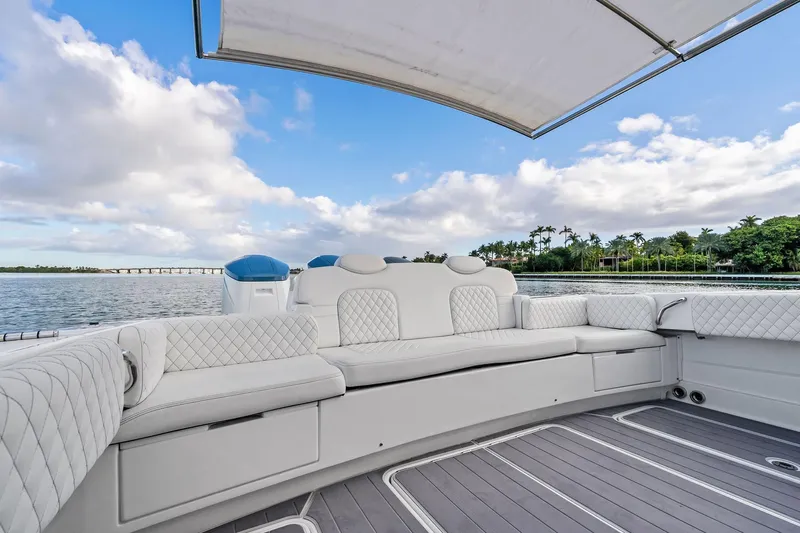 No Name Yacht Photos Pics Luxurious seating on 2023 HCB 42 Lujo boat with scenic waterfront view.