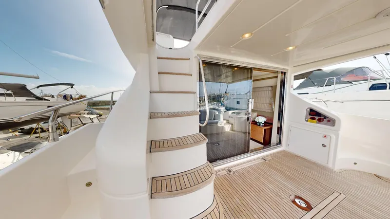  Yacht Photos Pics Azimut 58 yacht interior, 2011 model, featuring elegant design and spacious deck area.