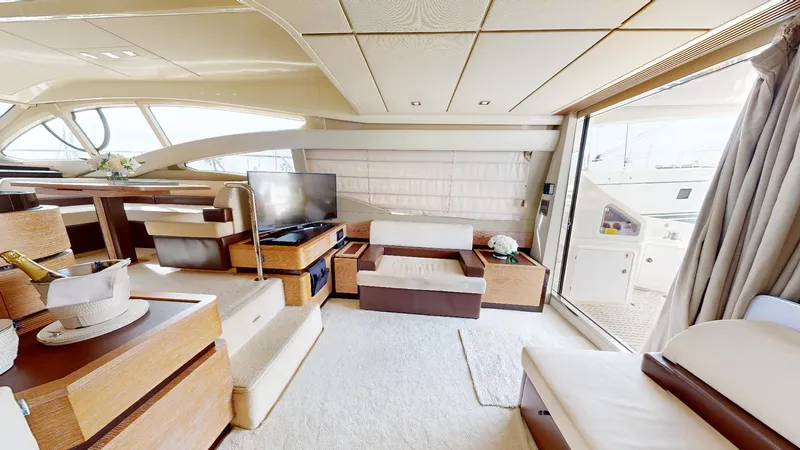  Yacht Photos Pics Luxurious interior of a 2011 Azimut 58 yacht, featuring elegant seating and modern amenities.