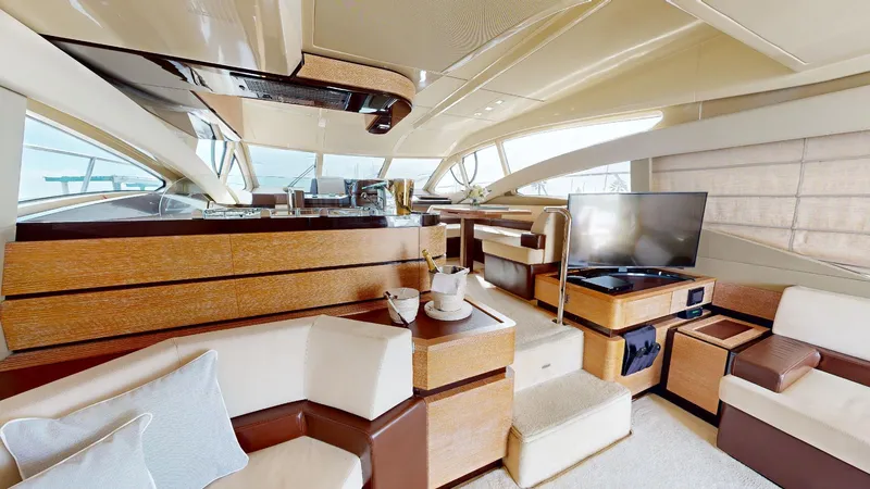  Yacht Photos Pics Luxurious interior of a 2011 Azimut 58 yacht with modern furnishings and large windows.