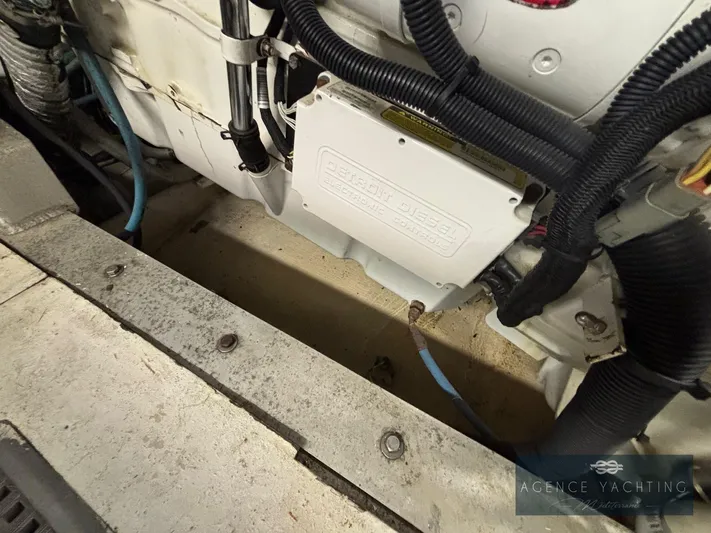  Yacht Photos Pics Engine compartment of 1987 Hatteras 85 yacht, showcasing mechanical components and wiring.