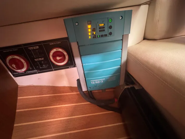 Sea-ductive Yacht Photos Pics Electrical panel in a 2011 Catalina 375 yacht interior, featuring a Powermax 12/40-3 charger.