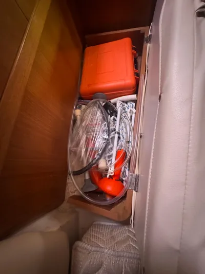 Sea-ductive Yacht Photos Pics Storage compartment in a 2011 Catalina 375 sailboat with equipment and supplies.