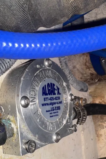 Sea-ductive Yacht Photos Pics Algae-X fuel conditioner in a 2011 Catalina 375 sailboat engine compartment.