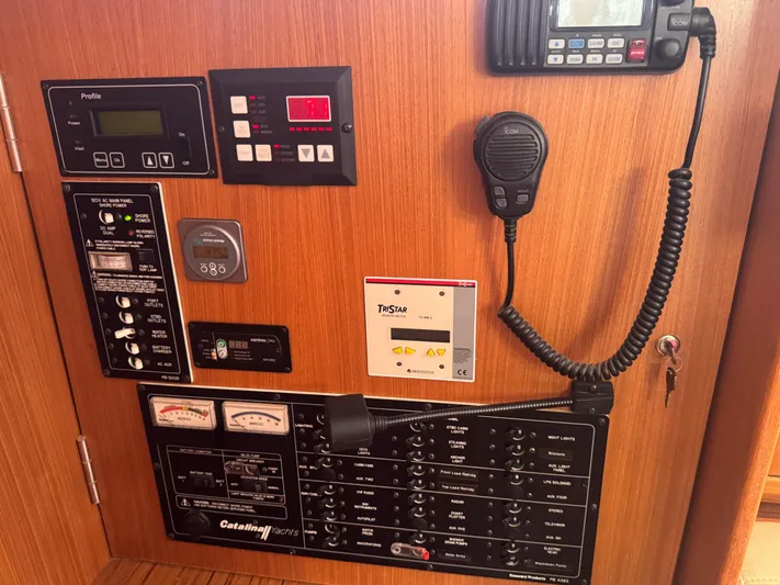Sea-ductive Yacht Photos Pics Control panel of a 2011 Catalina 375 sailboat with various instruments and a radio.