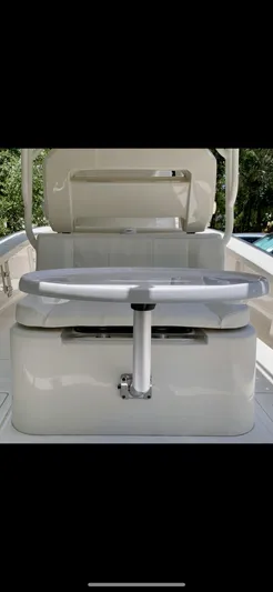  Yacht Photos Pics 2020 Calcutta 263 Center Console boat interior with seating and steering wheel.