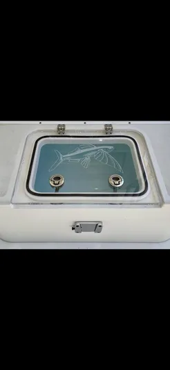  Yacht Photos Pics Calcutta 263 Center Console 2020 boat hatch with fish design on glass lid.