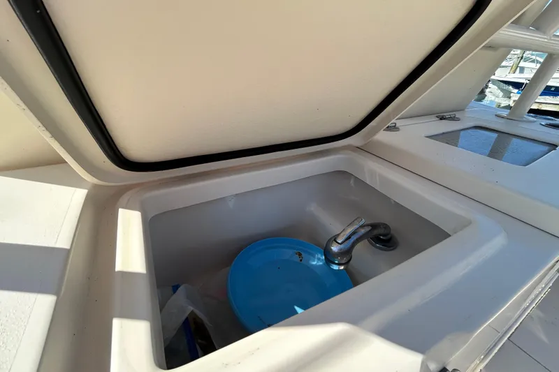  Yacht Photos Pics Grady-White Canyon 306 boat sink with blue dish, 2020 model.