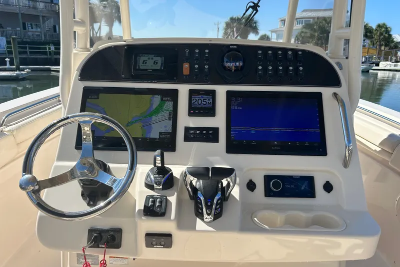  Yacht Photos Pics 2020 Grady-White Canyon 306 boat dashboard with navigation and control systems.