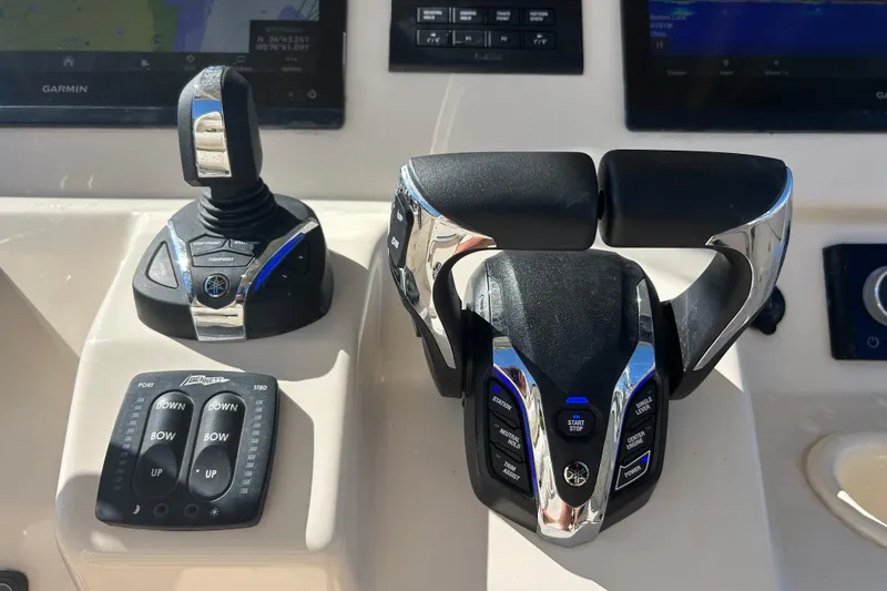 Yacht Photos Pics Control panel of a 2020 Grady-White Canyon 306 boat with advanced navigation systems.