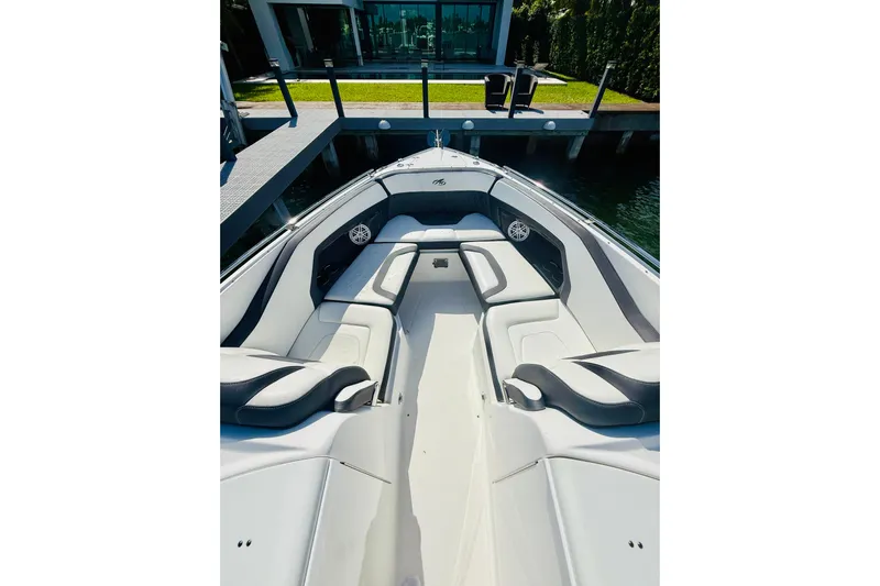  Yacht Photos Pics 2020 Monterey 328SS Super Sport boat interior with luxurious seating and waterfront view.