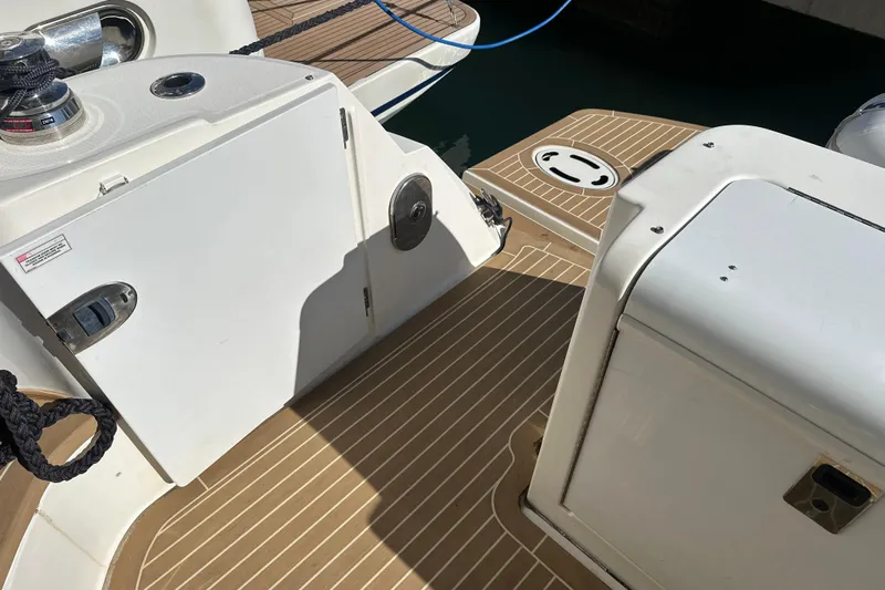 Motomar 1 Yacht Photos Pics 2008 Sea Ray 500 Sedan Bridge deck with storage compartments and winch.