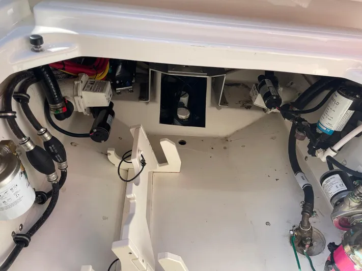  Yacht Photos Pics 2020 Pursuit S 288 boat engine compartment with wiring and components.