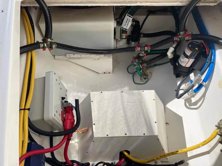  Yacht Photos Pics Electrical and plumbing components inside a 2020 Pursuit S 288 boat.