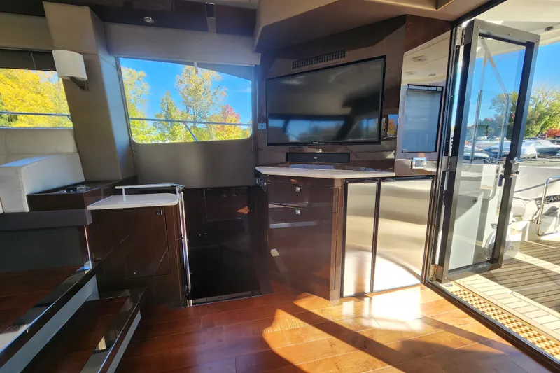  Yacht Photos Pics Interior of 2021 Carver 52 Command Bridge yacht with modern design and large windows.