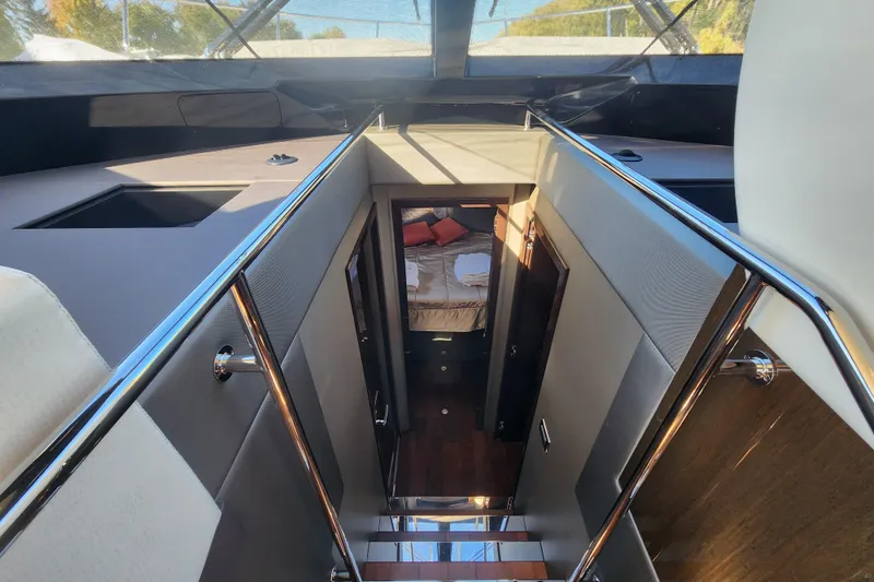  Yacht Photos Pics Interior view of 2021 Carver 52 Command Bridge yacht, featuring a luxurious cabin.