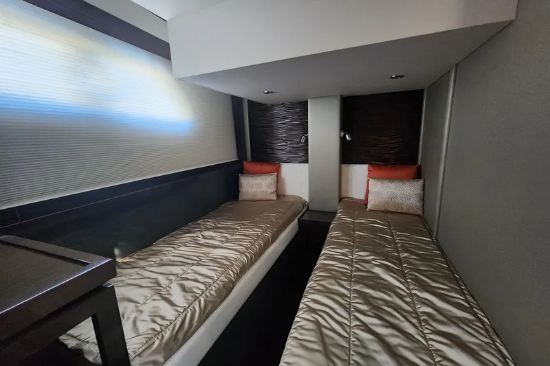  Yacht Photos Pics Interior of 2021 Carver 52 Command Bridge with twin beds and modern decor.