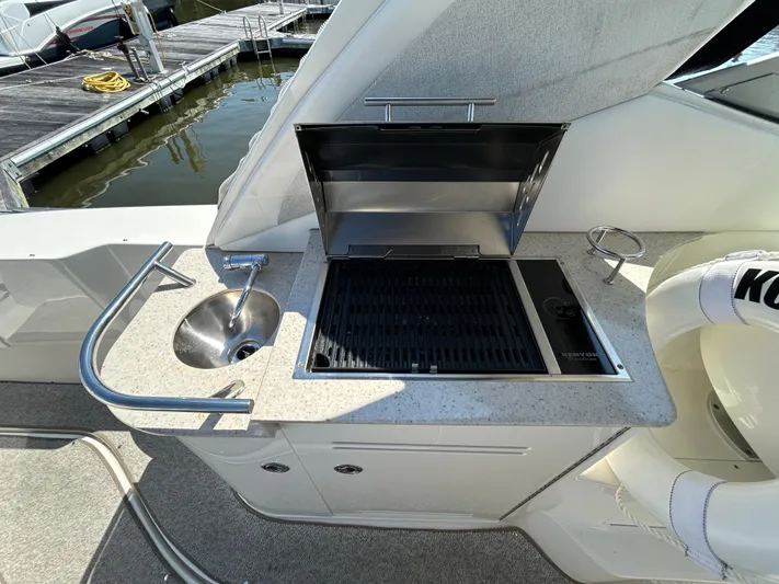  Yacht Photos Pics Outdoor kitchen on 2008 Sea Ray 330 Sundancer yacht with grill and sink.