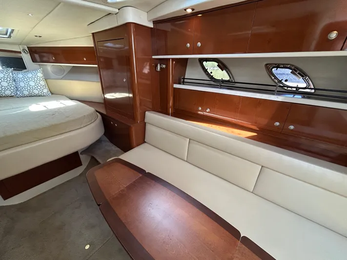  Yacht Photos Pics Luxurious interior of 2008 Sea Ray 330 Sundancer yacht with elegant wood finishes.
