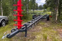 Trailer for Anytec A30 X-Tnd 2022, parked in a forested area.