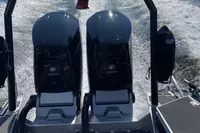 Twin outboard engines on 2022 Anytec A30 X-Tnd boat, cruising on water.