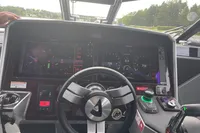 Cockpit of 2022 Anytec A30 X-Tnd boat with advanced navigation displays and controls.