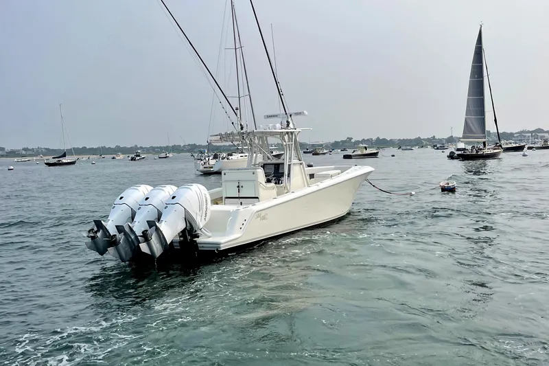  Yacht Photos Pics 2016 SeaVee 340Z boat with triple engines on a calm sea.