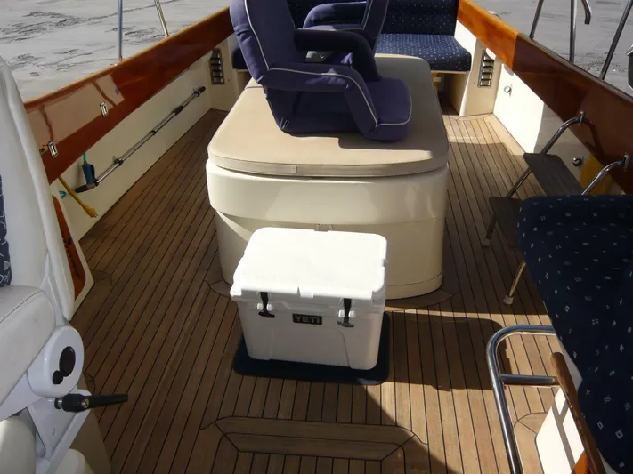 Courage Yacht Photos Pics Hinckley 36 Classic 1998 boat interior with wooden deck and seating.
